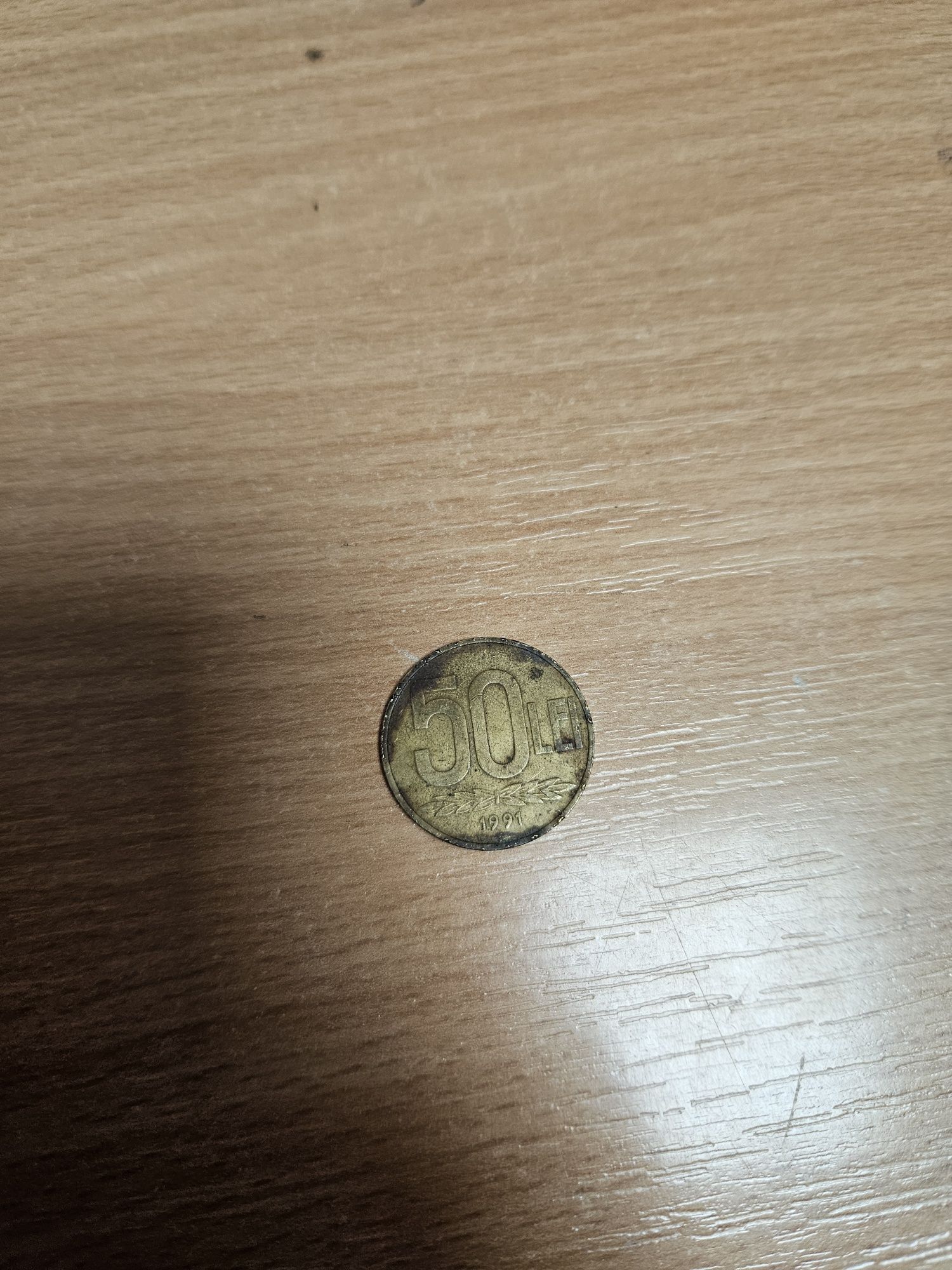 Vand moneda de 50 de lei