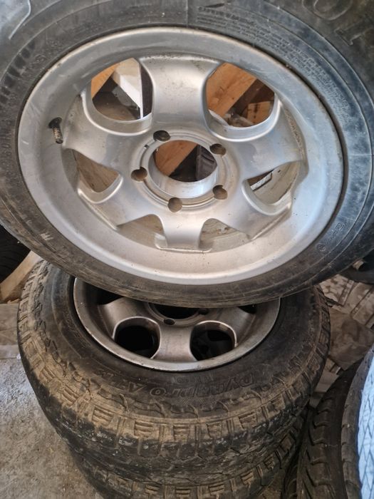 Vand 3 jante aluminiu + 1 tablă si cauciucuri 235  60 r16 suzuki grand