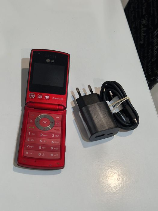 Super telefon Lg cu clapeta cu adaptor original