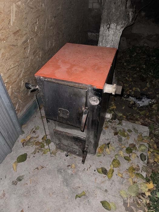 Продам Печку, котел универсальный