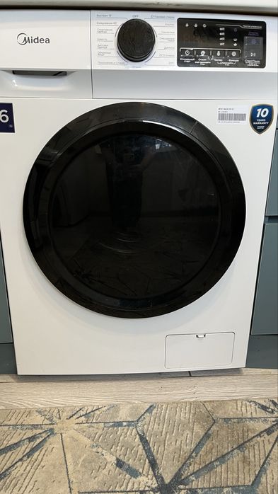 Стиральную машину Midea MFN11W60B