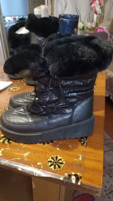 Продам женские сапоги