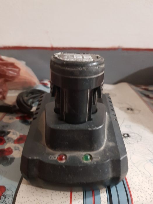 Vand incarcator+baterie Dexter