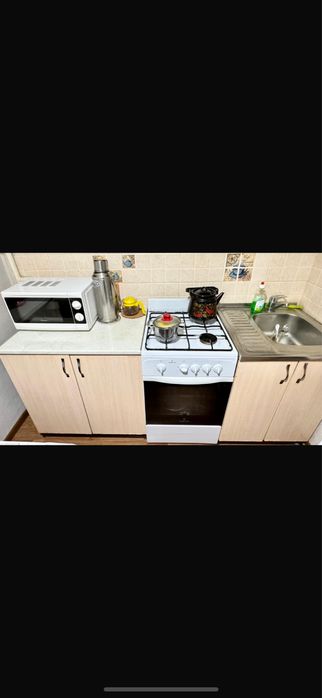 газовая плита белого цвета