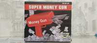 Продам новый денежный пистолет