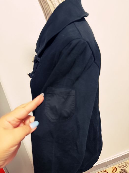 Pantaloni plus geanta