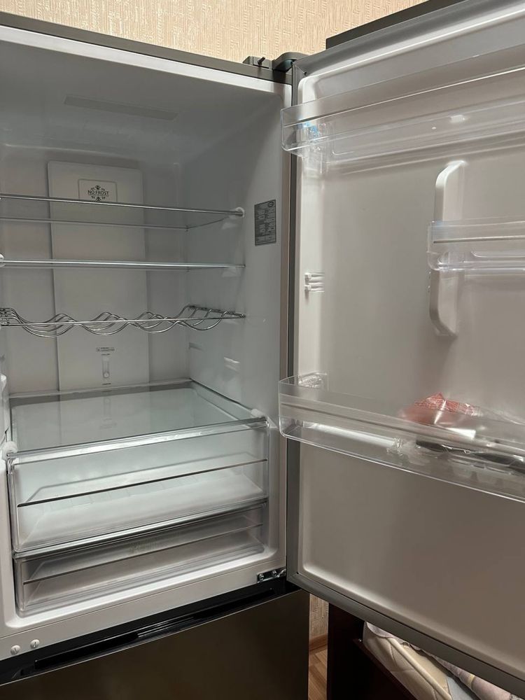 Продам холодильник haltsger, купили и не пользовались, как новый