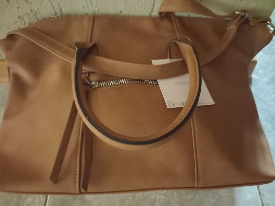 Качественную немецкую сумку, новую, продам