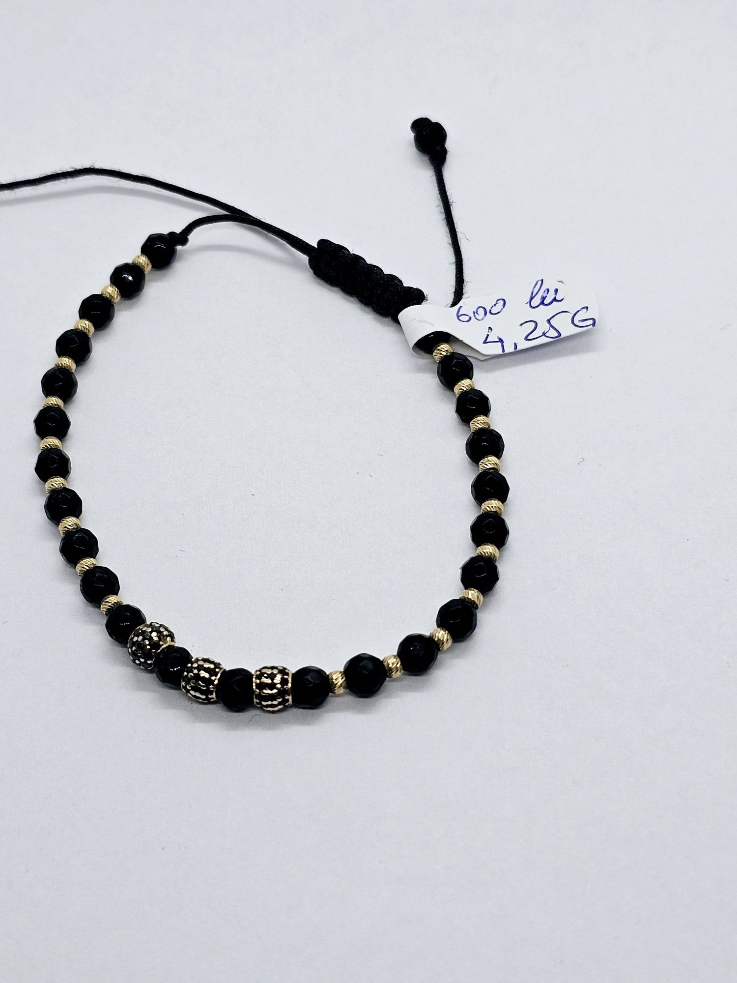 Vand bratara snur cu bile din aur 14 k cod 494
