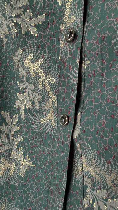 Новая блузка в M/L размере.