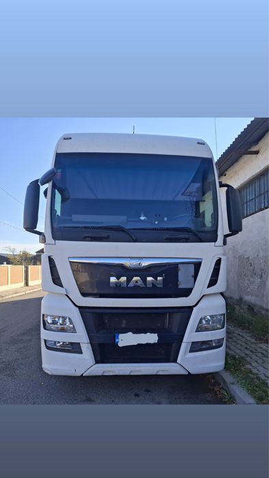 Ansamblu MAN + semiremorcă SCHMITZ