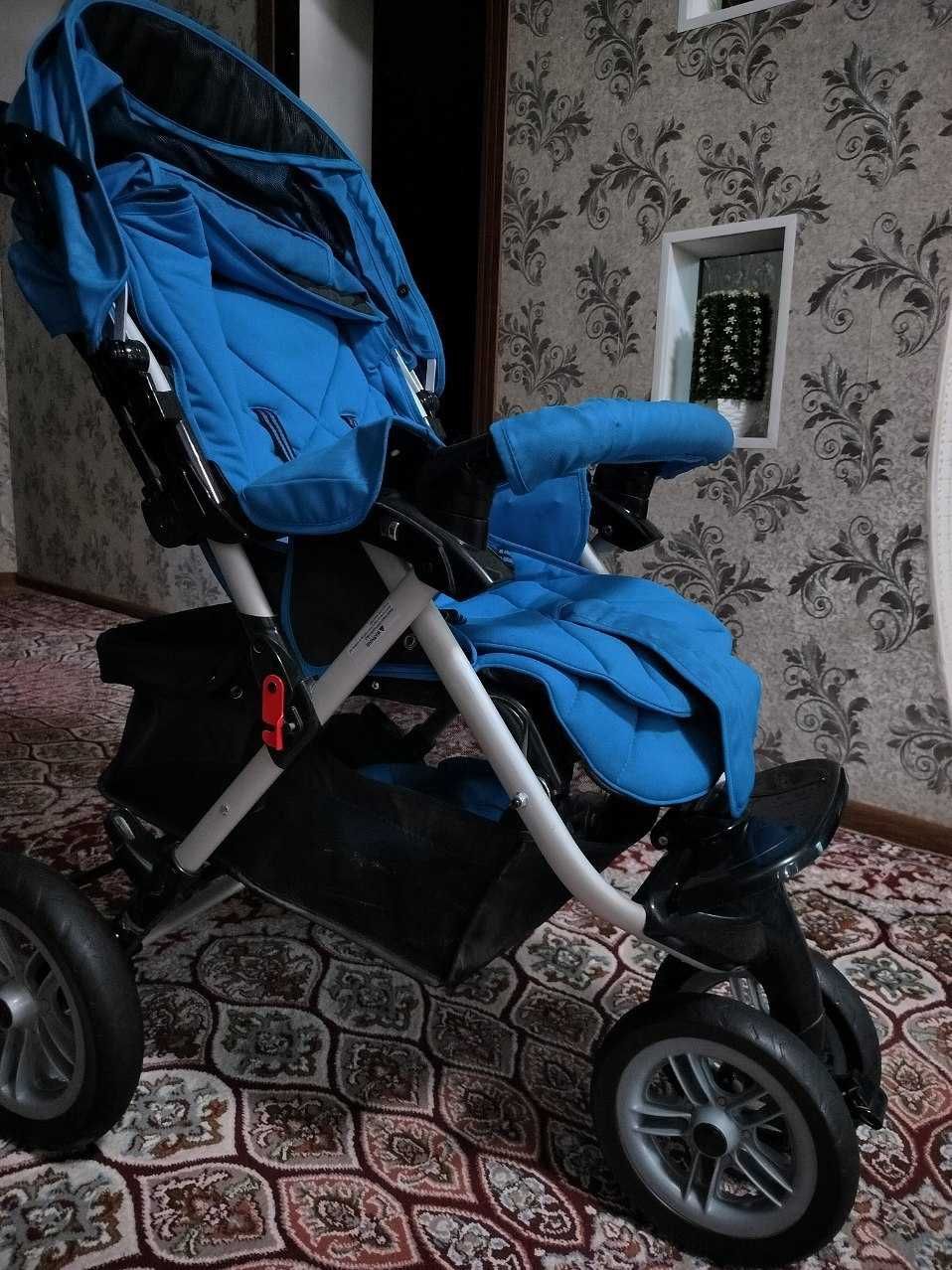 Коляска трех колесовая