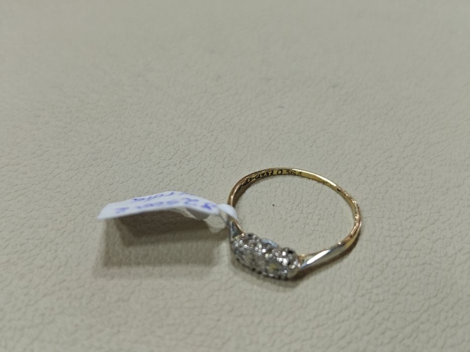 Inel aur 18k 1.47gr cu 3diamante 0.015ct montate in platina (r)