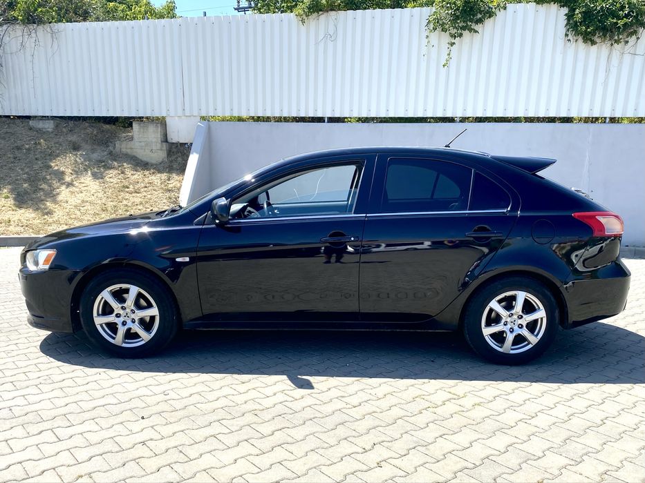 Mitsubishi Lancer - 1.6i - 2010 - xenon - carte service