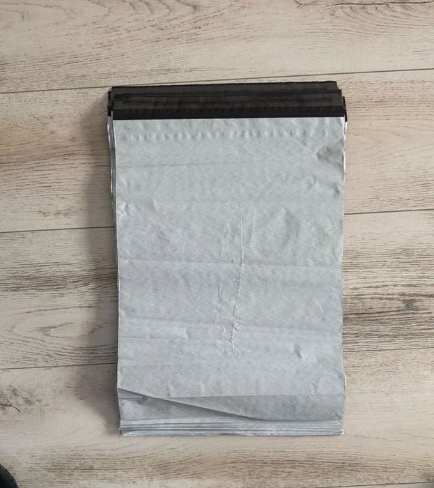 50 pungi albe pentru curierat