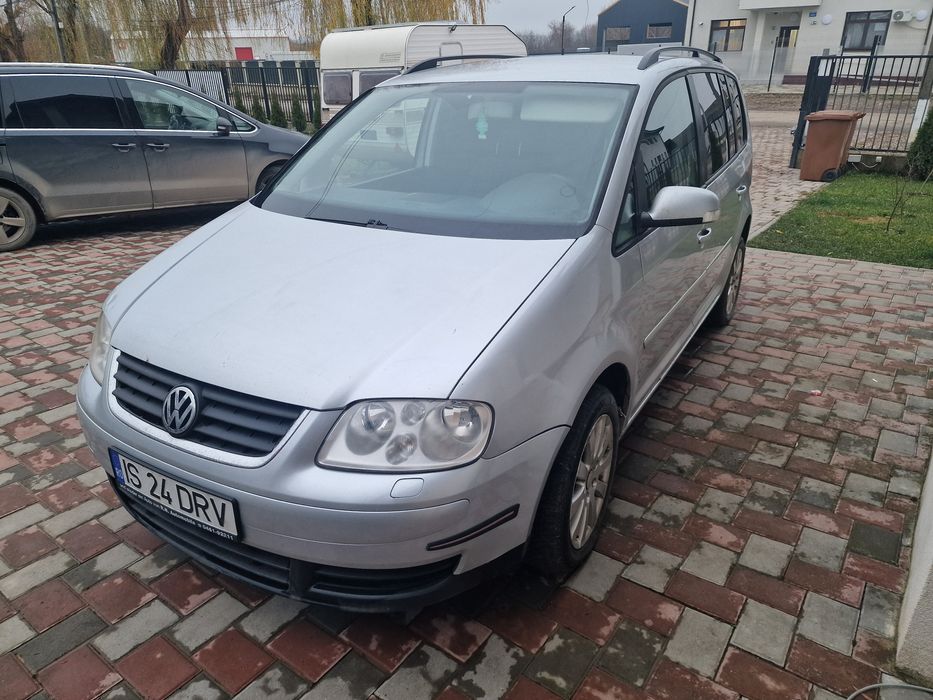 Vând touran 2.0 bkd 7 locuri