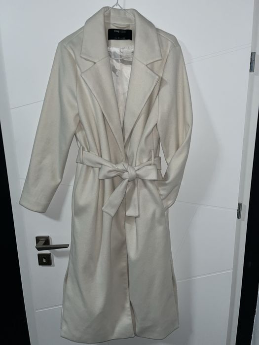 Страхотно чисто ново палто