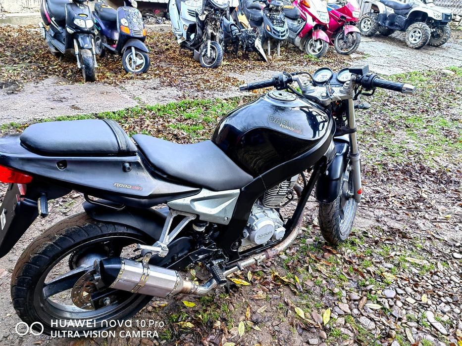 Motocicleta impecabilă Daelim Roadwin motorizare 125cc-4T. Neg.