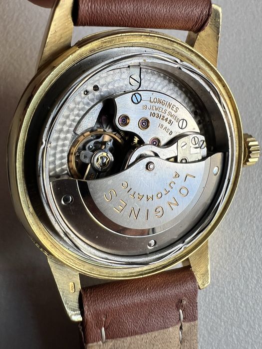 18 k aur Longines Conquest Calendar Automatic cal.19ASD ref.9005
