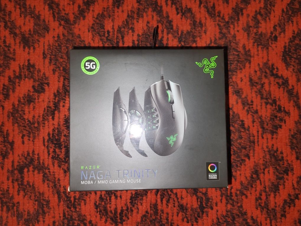 Срочно продам новую игровую мышь Razer Naga Trinity за 30 000тенге.