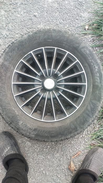 Продам Шины с дисками 185/70/R14 Cordiant