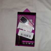 Vând  telefon miniatura dual sim roz