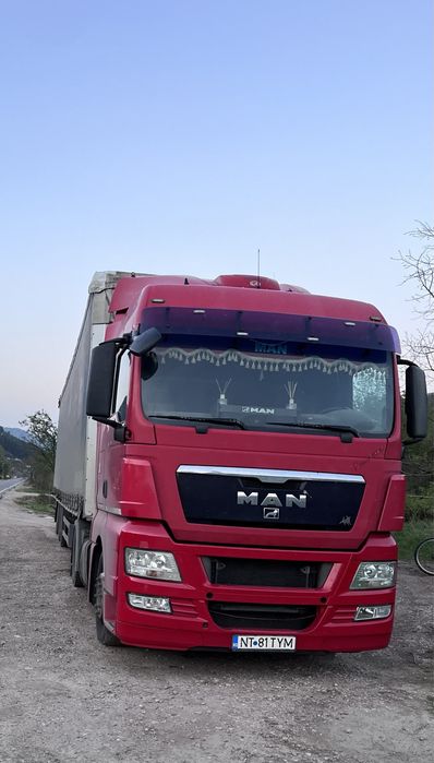 Man TGX+semiremorca Schmitz