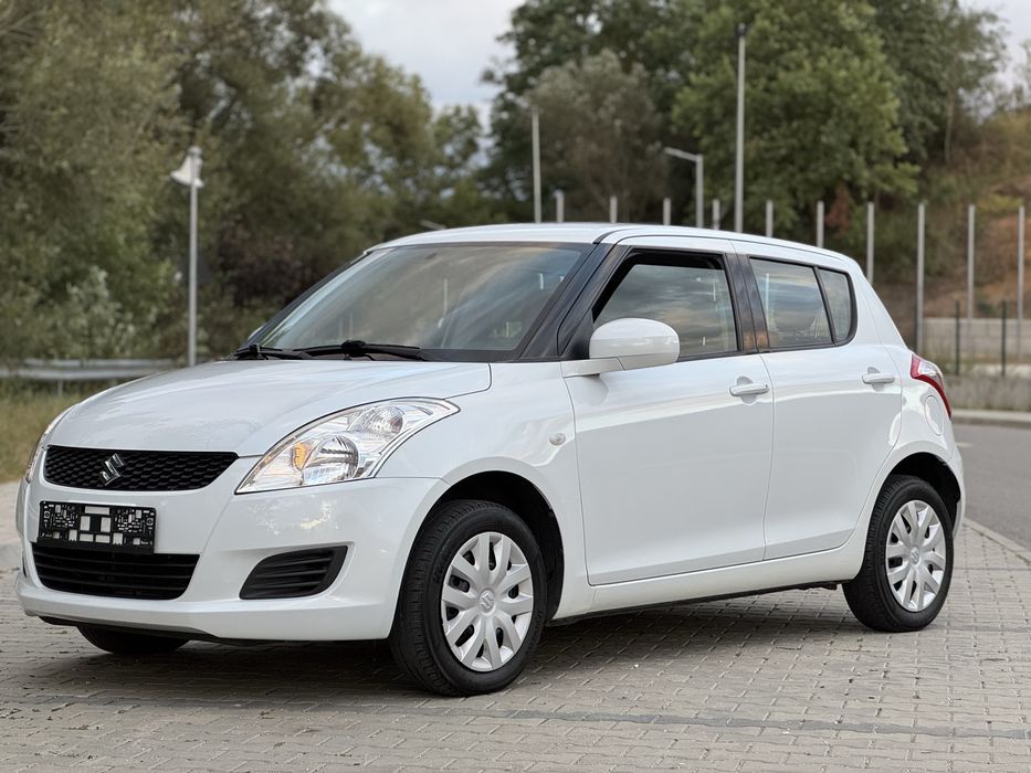 Suzuki Swift 4x4 - 2012 - 1.2 benzina - Alb perlat / Klima