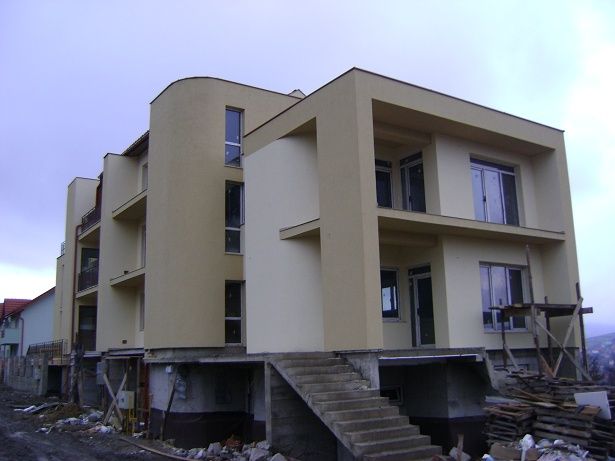 Executam lucrări în  construcții case în rosu și finisat