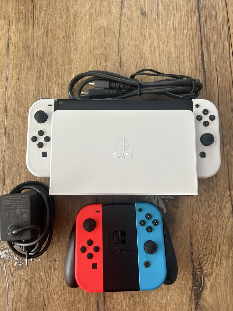 Nintendo switch oled cu extra joycon si ringfit adventure