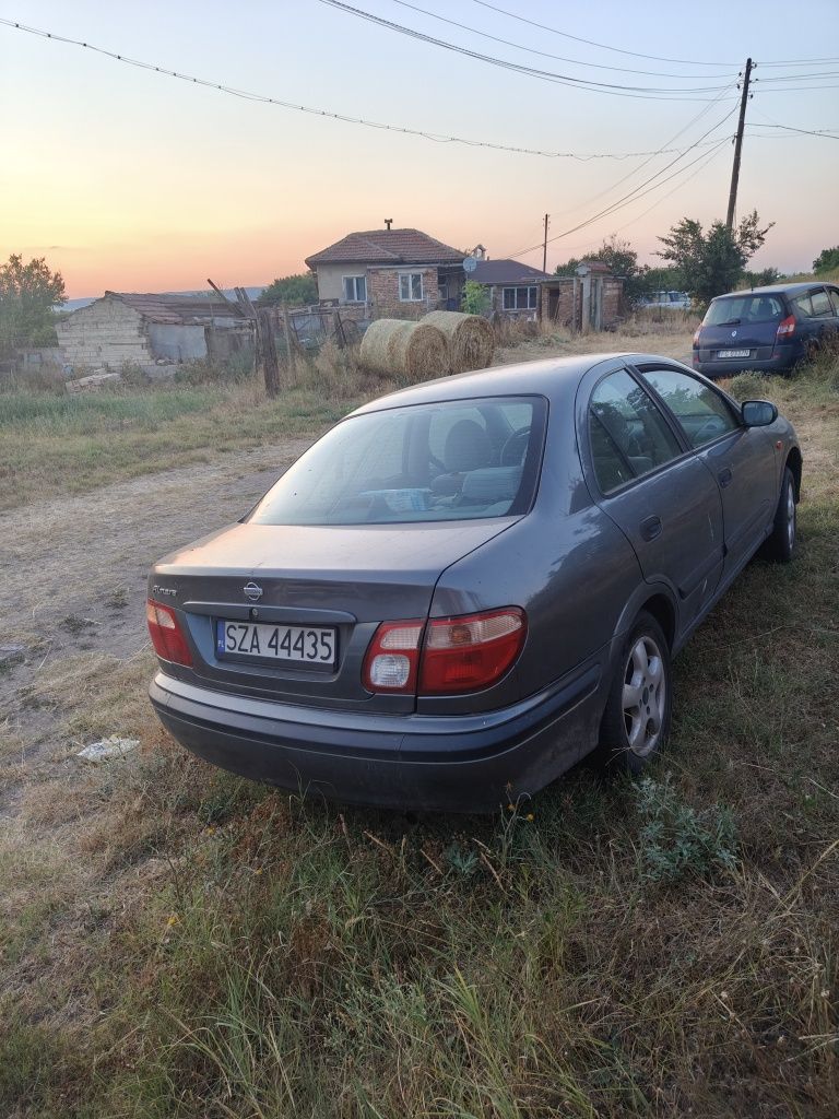 Nissan Almera  1.8 газ бензин