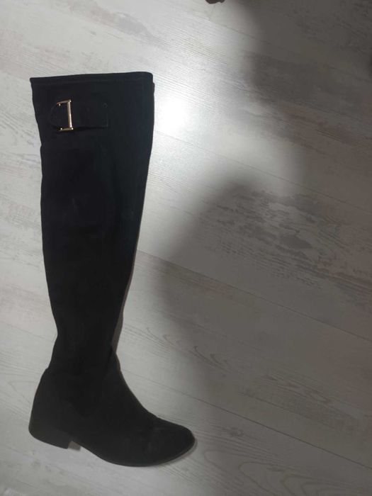 Чизми над коляното