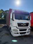 Man (camion tandem) tgx 24440,cu axa spate viratoare