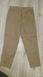 Pantaloni băiat de culoare crem