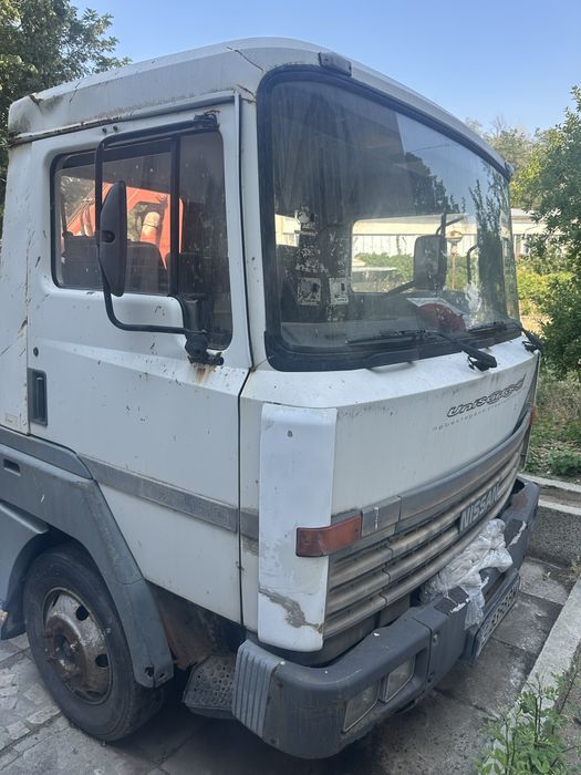 Нисан М75/150 камион 7.5 т , каросерия 4.2 м