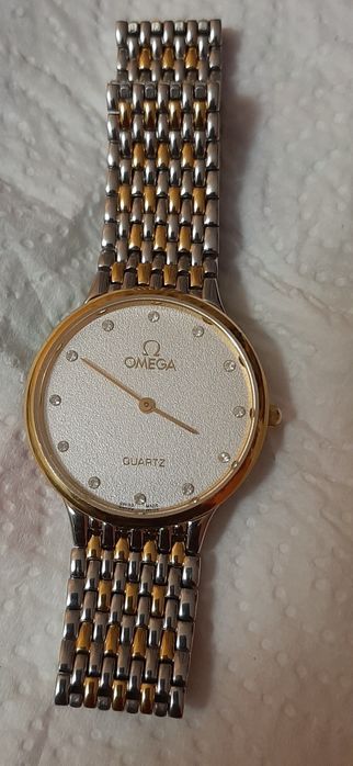 Продавам Масивен тънък часовник omega Работещо/внос от Швеция