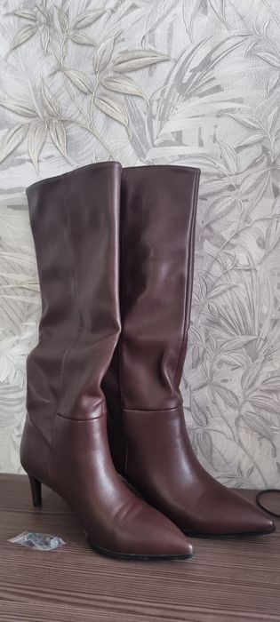 Продам новые сапоги