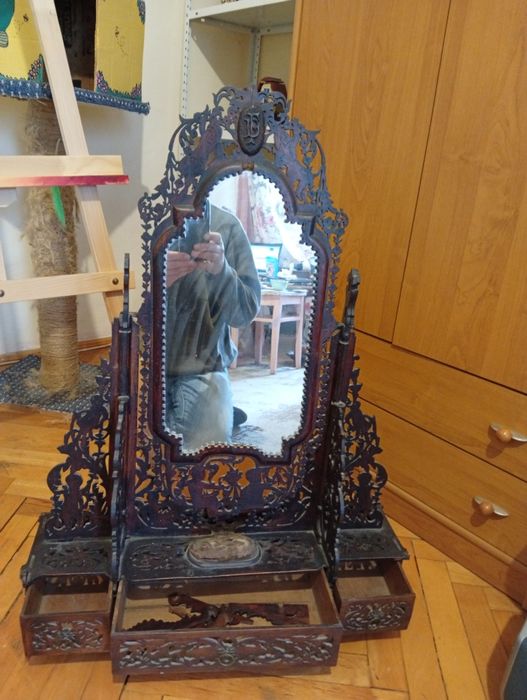 Veche oglindă croitorie