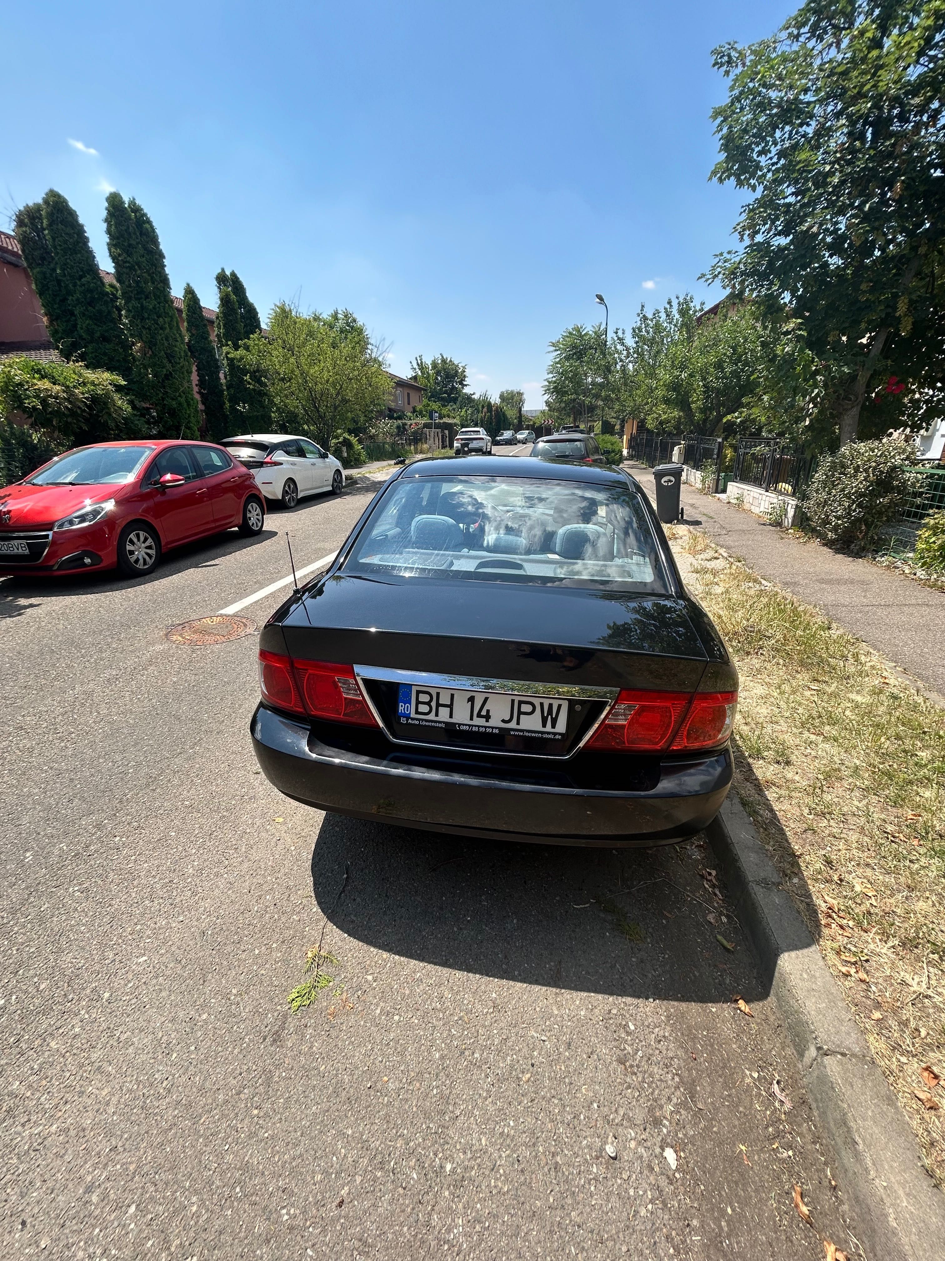 AutoKia Magentis