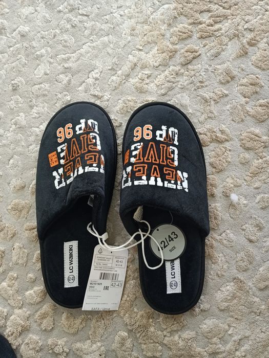 Новые тапочки р 40-41. Цена 2000