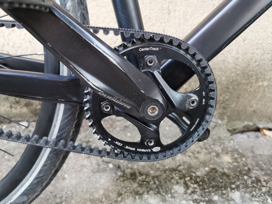 Bicicleta CUBE Hyde pe curea gravel city trekking