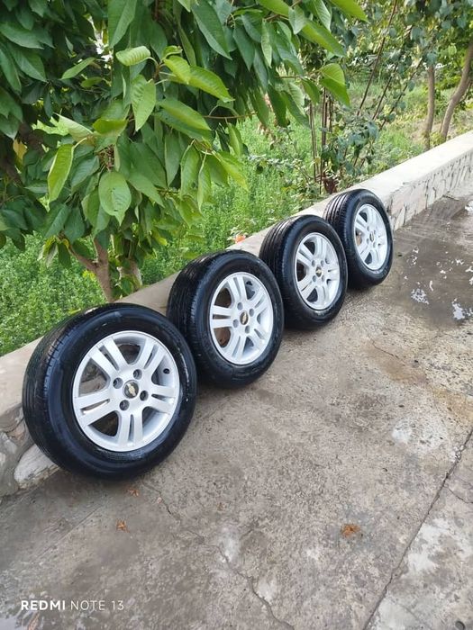 Продам  диски  с резиной.