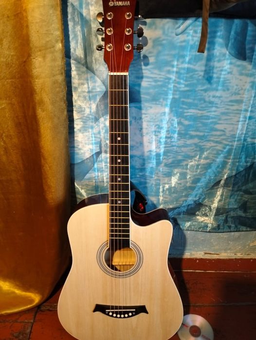 Новая гитара продам