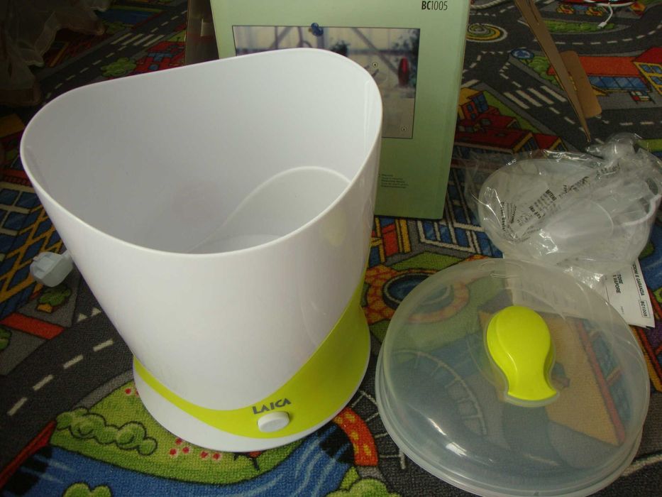 Sterilizator nou de biberoane cu aburi Laica BC1005+încălzitor Laica.