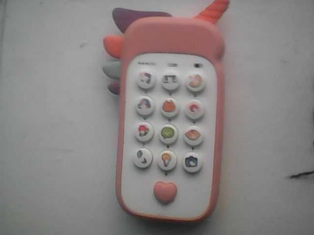 Продам детскую игрушку с музыкой.