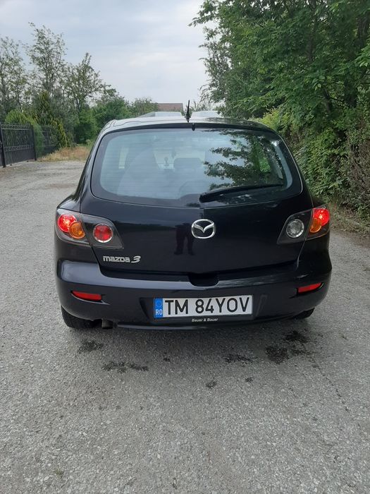Vând sau schimb  mazda 3