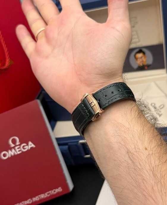 omega speedmaster златно/зелено