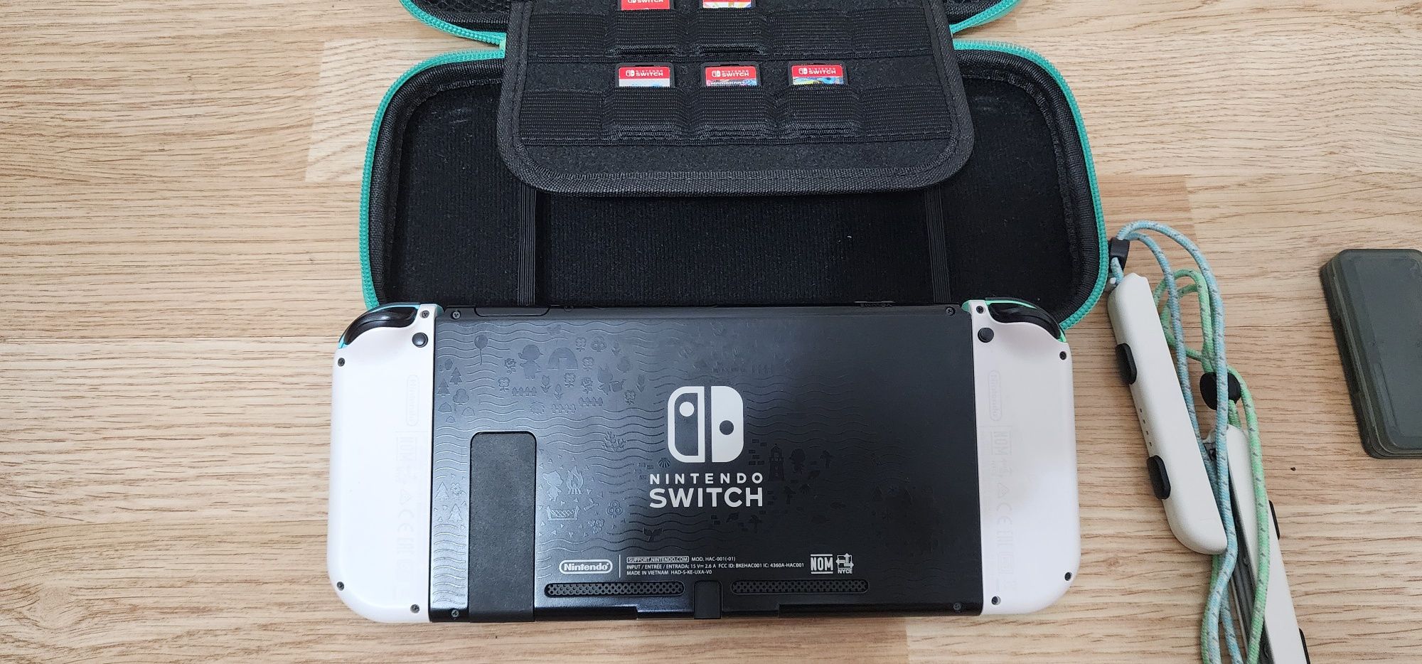 Nintendo Switch Animal Crossing с аксессуарами и играми .