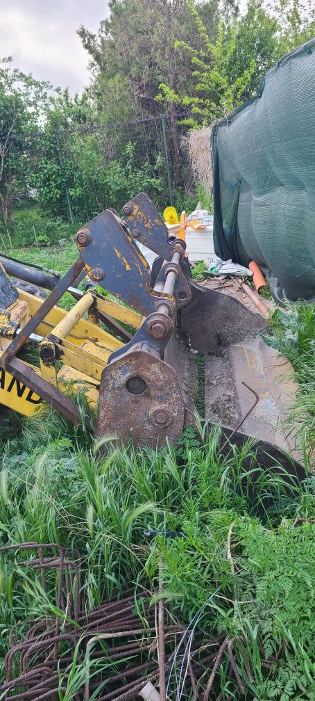 NEW Holland de vânzare Buldoexcavator