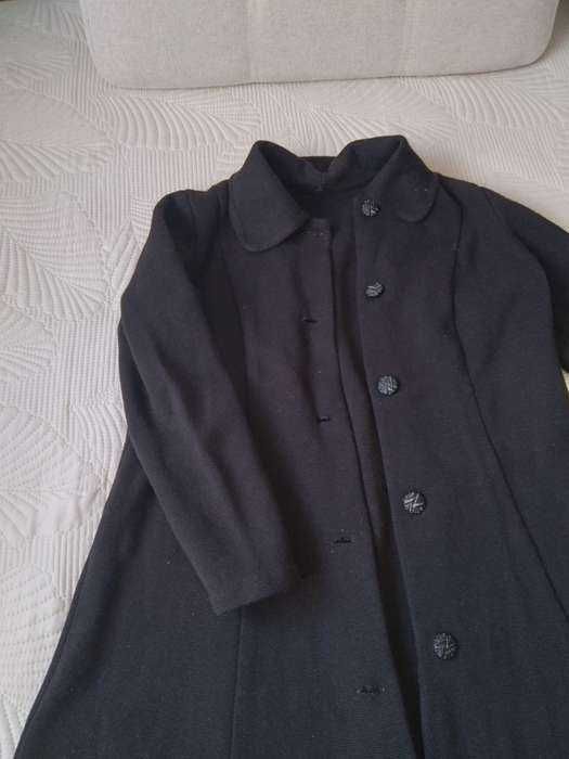 Продам новое шерстяное пальто 52 размер